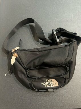 The North Face Black Belt Bag with Gold Logo and Accents